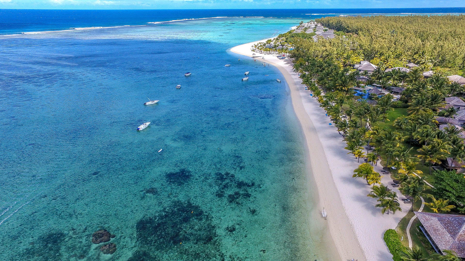Oceano e recife em Le Morne